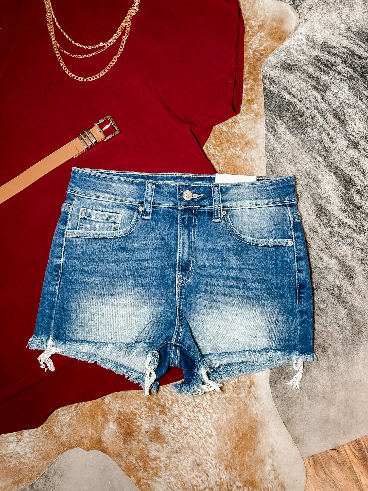 Maycie mid-rise raw hem denim shorts
